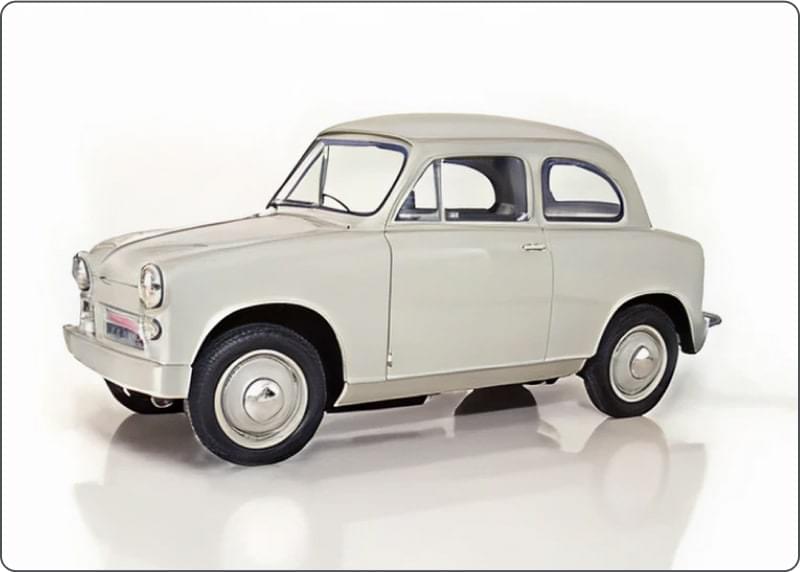 スズキが発売した軽四輪車「スズライト」。白く丸みのあるヴィンテージカー。